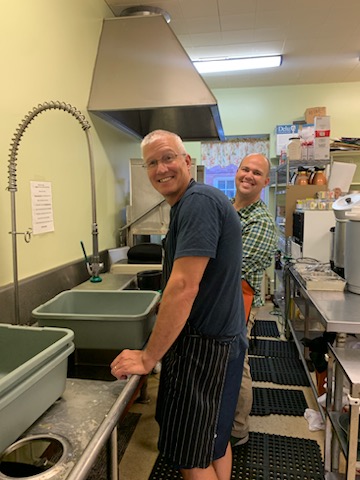 Washing dishes at Cafe Connection